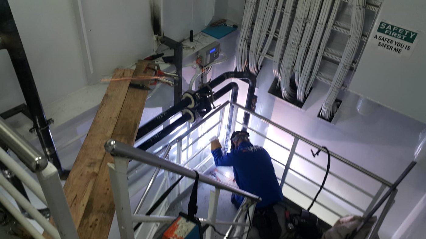 Confined space execution — Hot work below cable tray runs